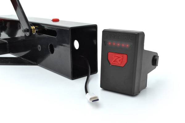 Holeshot Pro Gate closeup of the battery pack pulled out showing the USB-C connection