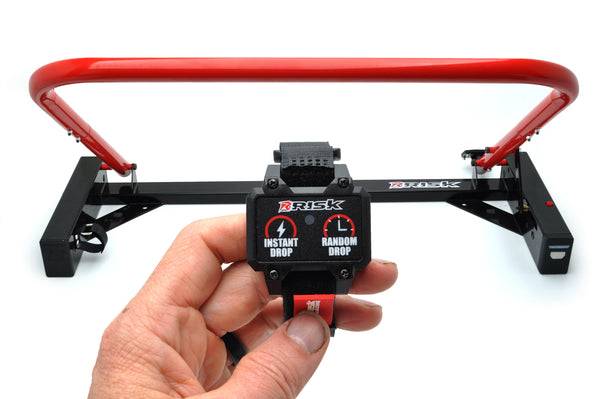 PRO Holeshot Starting Gate on white remote in hand